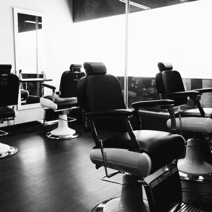 Get Smart Hair several barber chairs black and white image Get Smart Hair several barber chairs black and white image