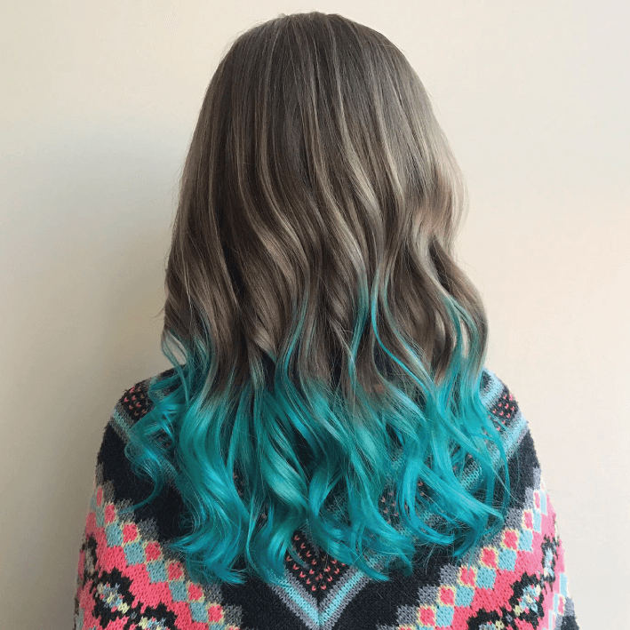 Get Smart Hair Back of woman's head with long wavy hair brown to blue ombre Get Smart Hair Back of woman's head with long wavy hair brown to blue ombre